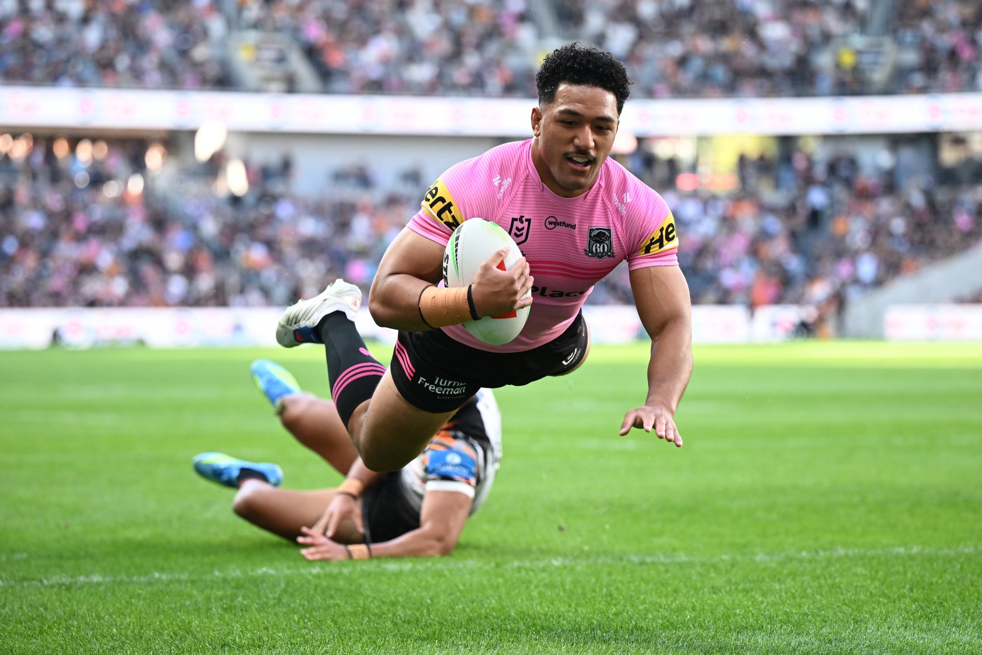 Star Panther re-signs amid salary cap squeeze