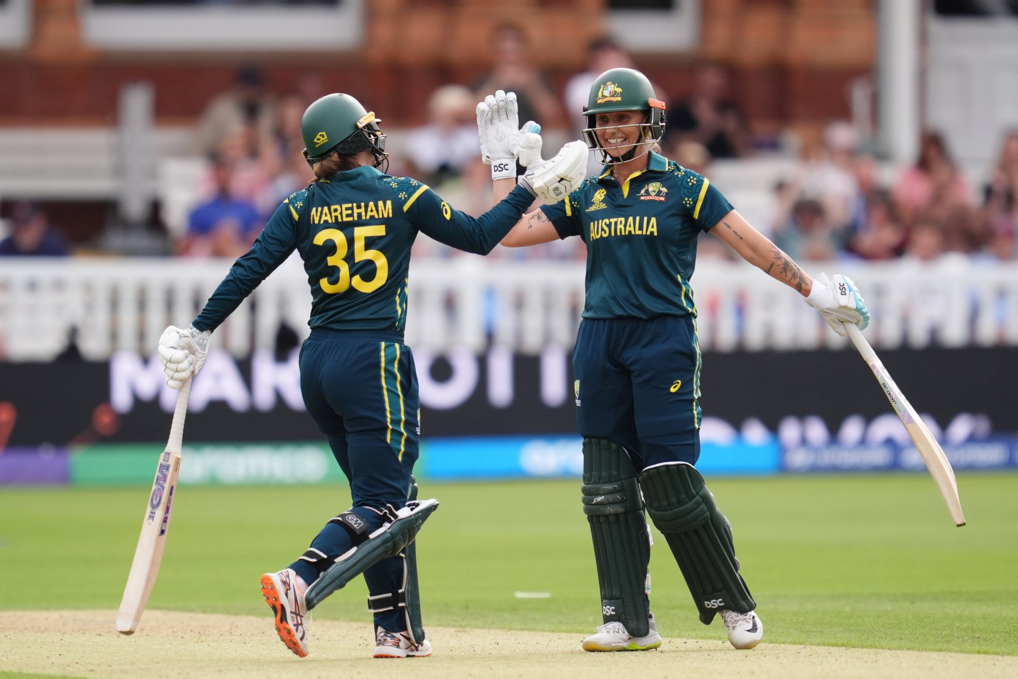 Gardner 50 in record chase helps Australia surge to T20 World Cup semis undefeated