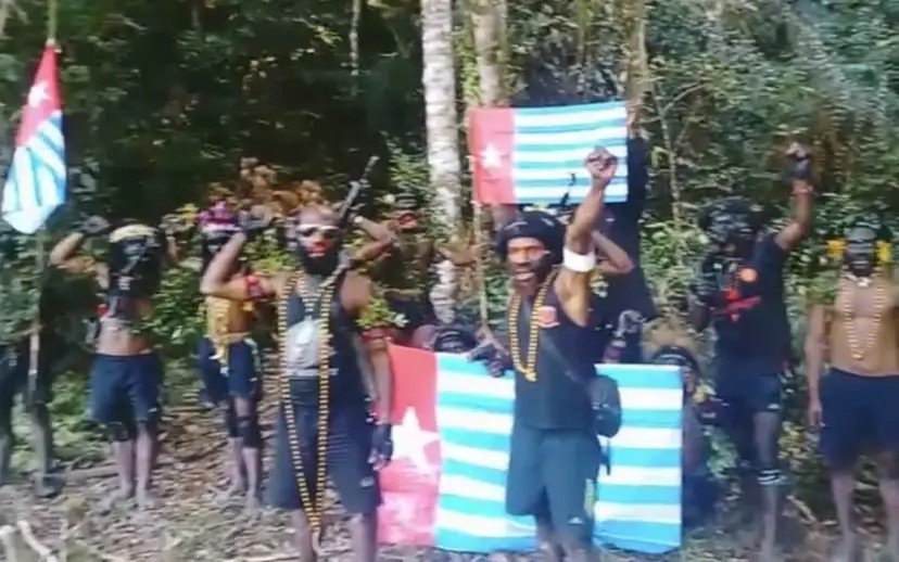 Indonesian security forces hunt for West Papuan militants who killed workers accused of spying for Jakarta