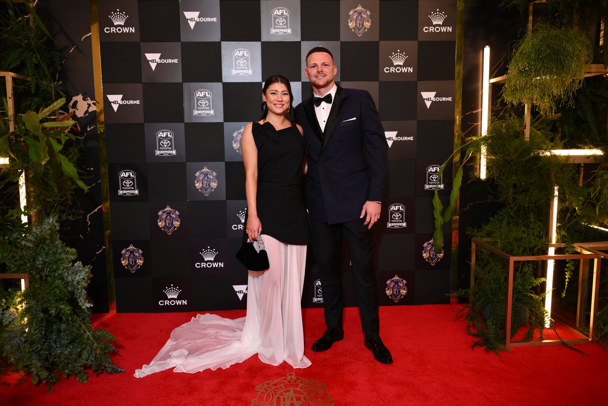 Indigenous ex-AFL star's partner sues Demons over privacy breach