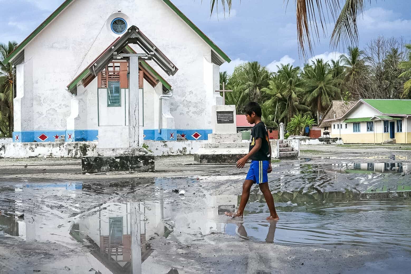 Tuvalu insurer pays out historic high tide weather event claims to affected island communities
