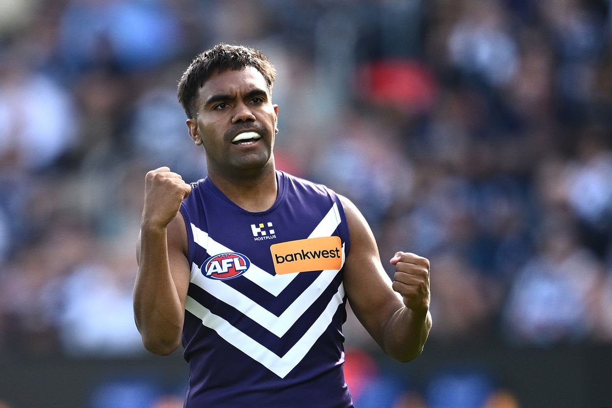 Dockers forward locks in with extension, as delistings begin around the AFL