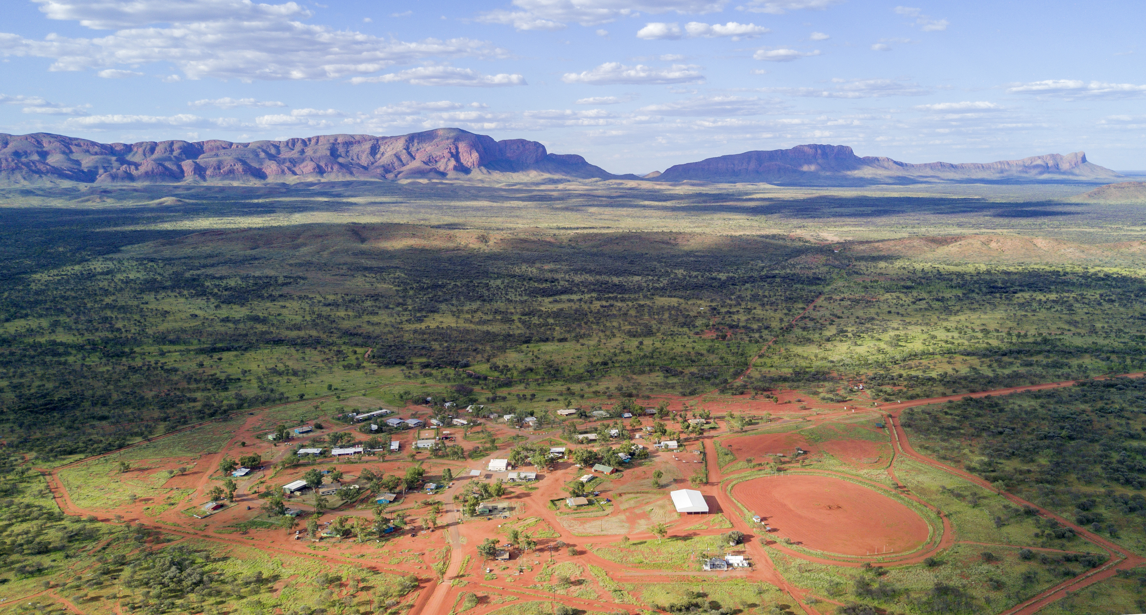 Aerial photography of the Haasts Bluff community where Ikuntji Artists are based.