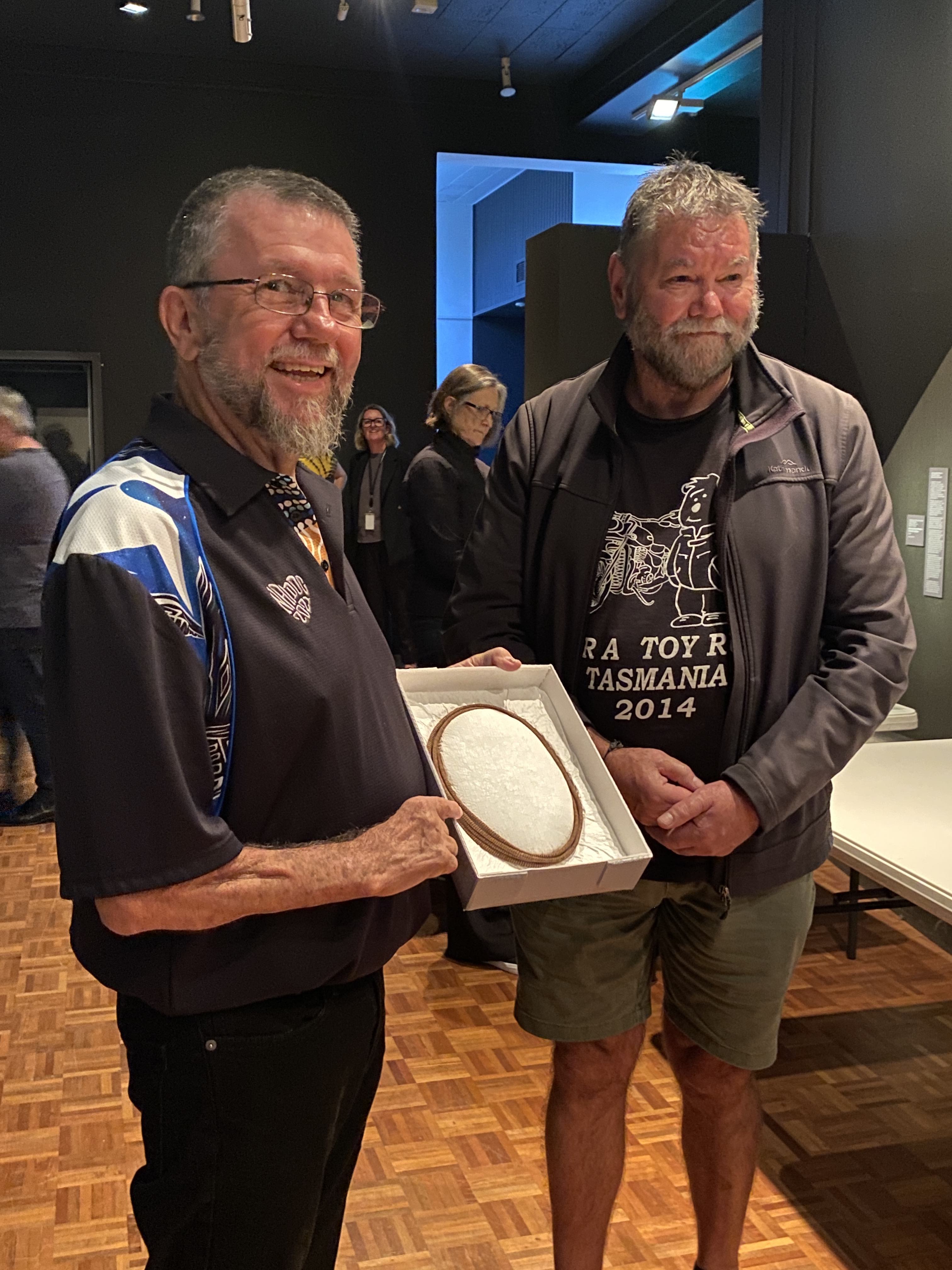 Artist Andrew Gall (L) and Team Leader First Peoples Art and Culture Tony Brown (R) with ochre cord necklace